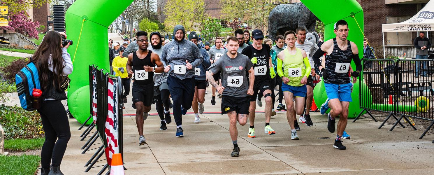 Community members and PFW employees participate in a 5K.